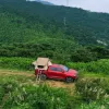 图片 The rooftop tent comes with 280TC 2000 waterproof plaid and is used as a camping essentials mobile home